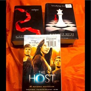 Set of 3, like New. Stephanie Meyer books. Includes 2 hard/ SoftBack Books.
